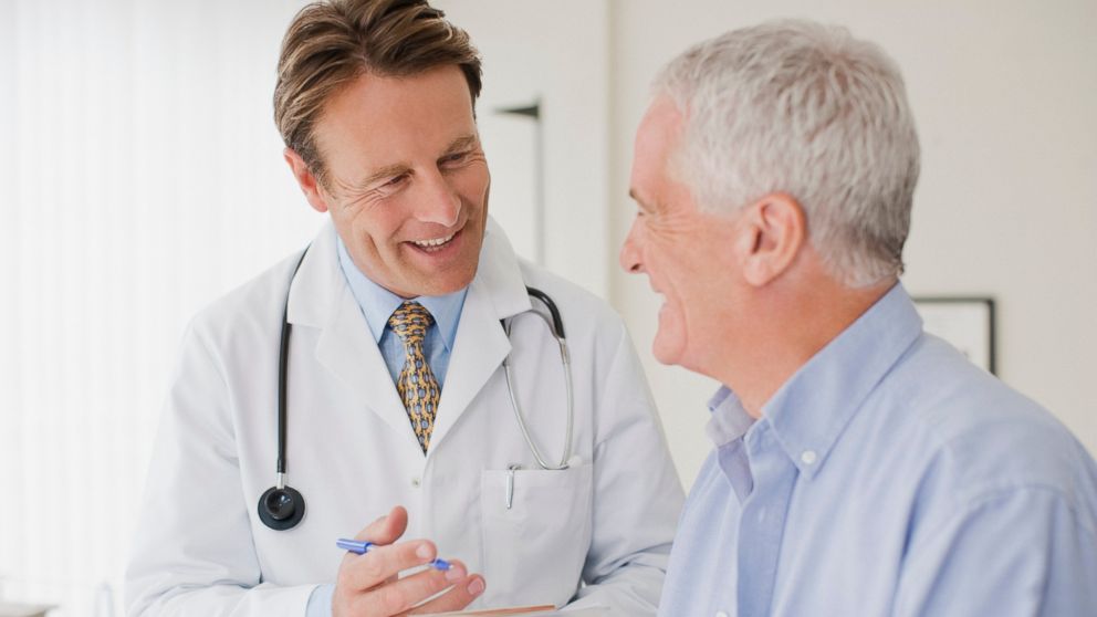 In this undated stock image, a doctor is pictured speaking with a patient. 
