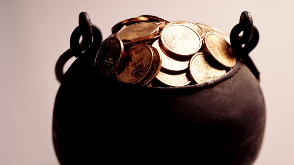 In this stock image, a pot of gold coins is pictured. 
