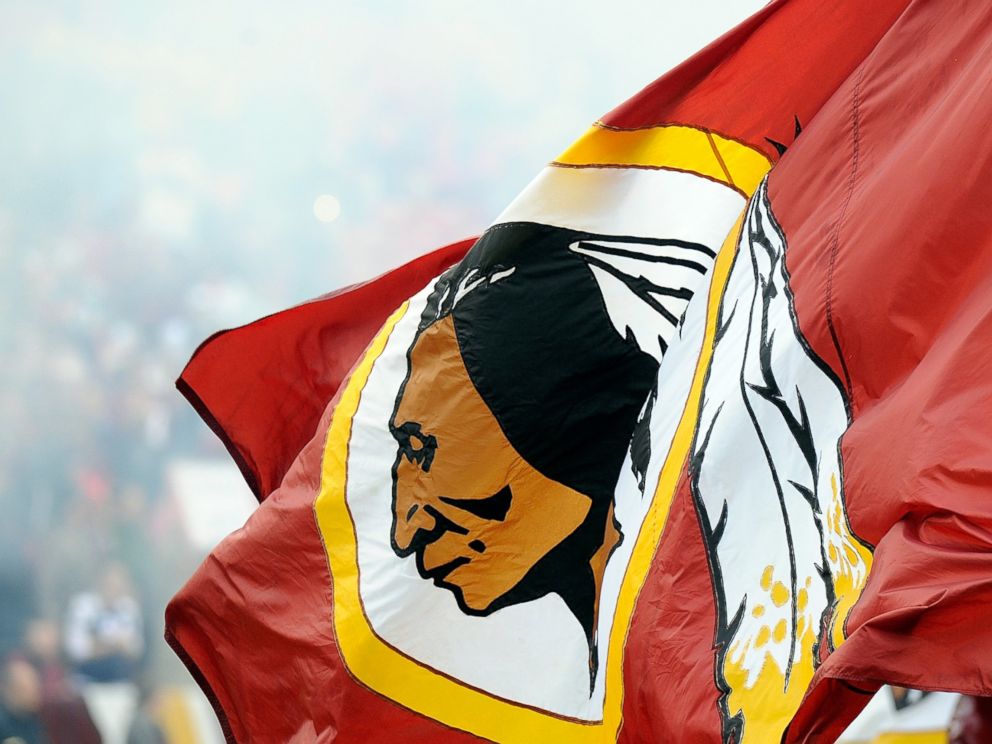 PHOTO: A Redskins flag is displayed at a game between the Dallas Cowboys and the Washington Redskins