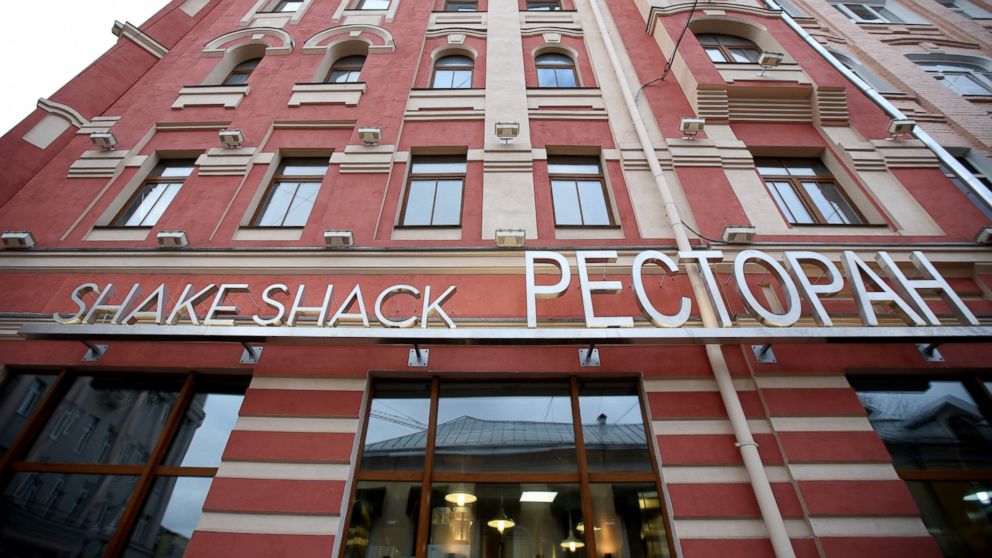 A logo sits on display outside the first Shake Shack burger restaurant to open in Moscow, Dec. 24, 2013.   