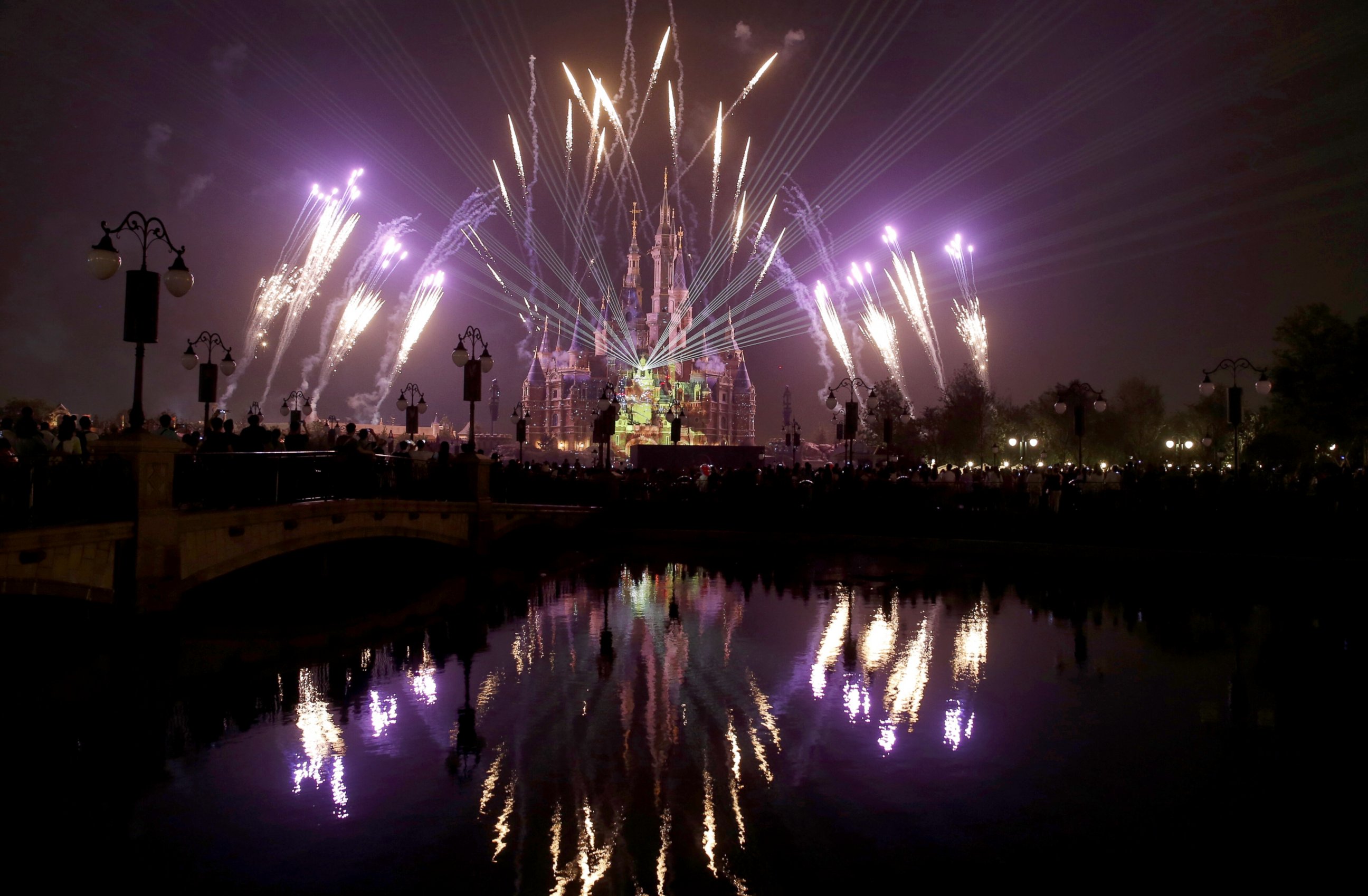 PHOTO: Fireworks light up the Enchanted Storybook Castle as a shining symbol of Shanghai Disneyland on May 25, 2016 in Shanghai, China.