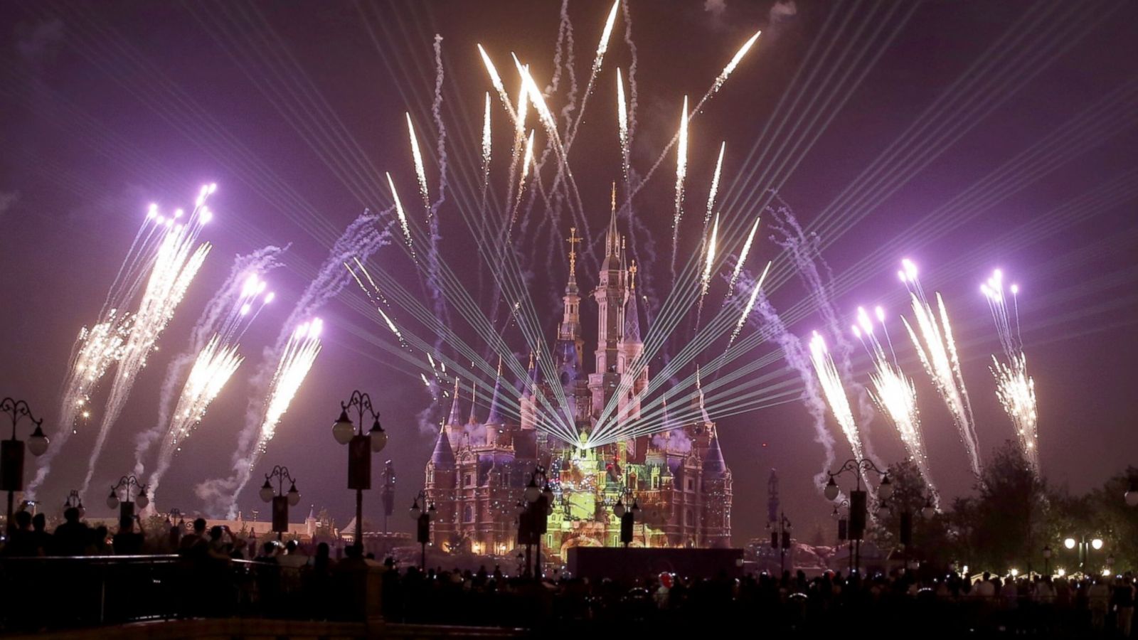 PHOTO: Fireworks light up the Enchanted Storybook Castle as a shining symbol of Shanghai Disneyland on May 25, 2016 in Shanghai, China.