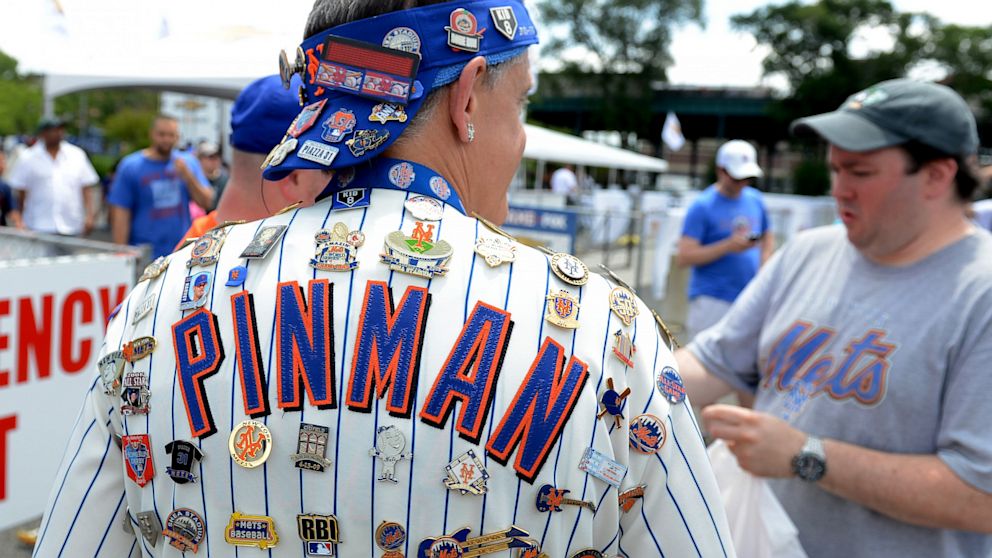 A fan adorned with pins outside Citi Field prior to the 2013 SiriusXM All-Star Futures Game at Citi Field, July 14, 2013, in New York City.