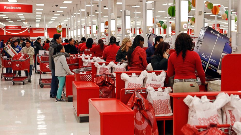 Customers shop at a Target Corp. store opening ahead of Black Friday in Chicago, Nov. 28, 2013.