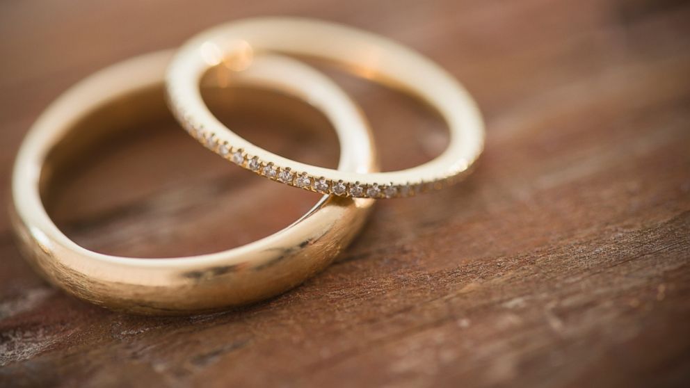 Wedding rings are pictured in this stock photo. 