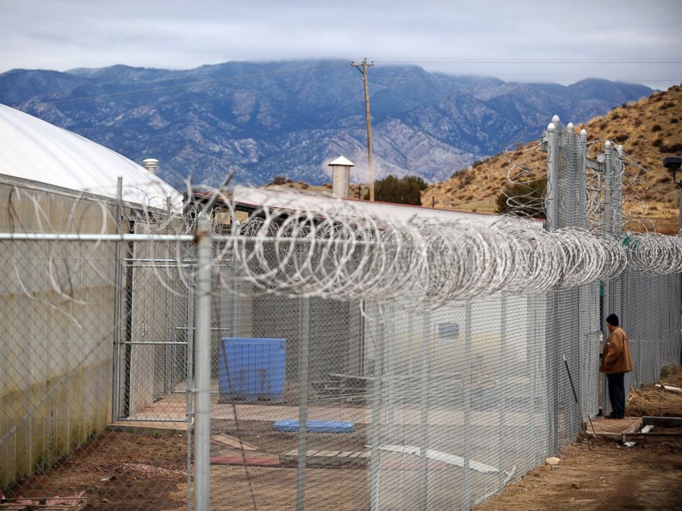 PHOTO:A Canon City Inmate working for Colorado Correctional Industries awaits entrance into a greenhouse housing tilapia fish at the East Canon City Prison Complex, in Canon City, Co., Nov.30, 2010.