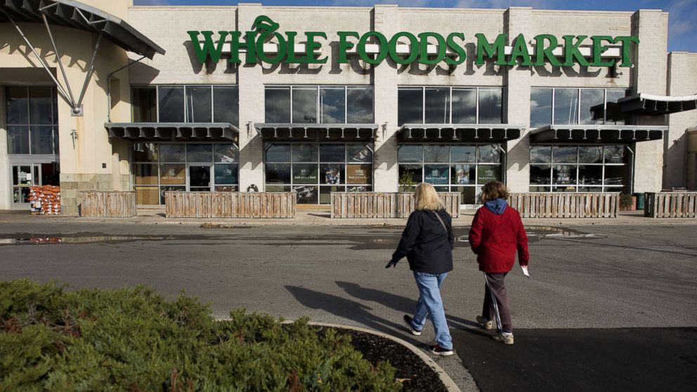 Customers are pictured arriving at a Whole Foods in Dublin, Ohio on Nov. 7, 2014. 