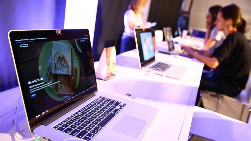 PHOTO: Guests interact with laptops at Spring Studios during the Tribeca Film Festival on April 15, 2015 in New York.