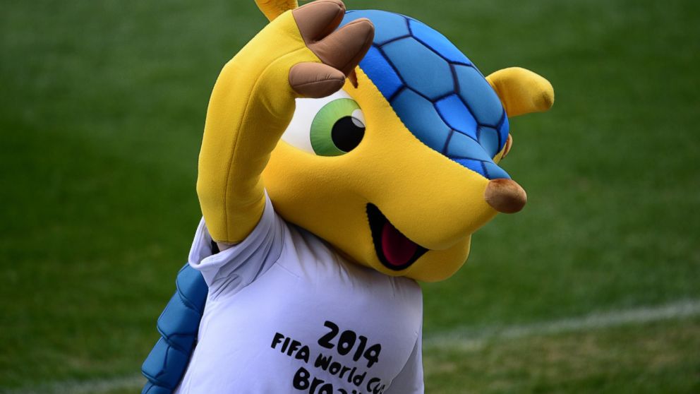 Fuleco the Armadillo, the official mascot of the 2014 FIFA World Cup Brazil, waves during a training session at the Vicente Calderon stadium in Madrid, March 4, 2014.