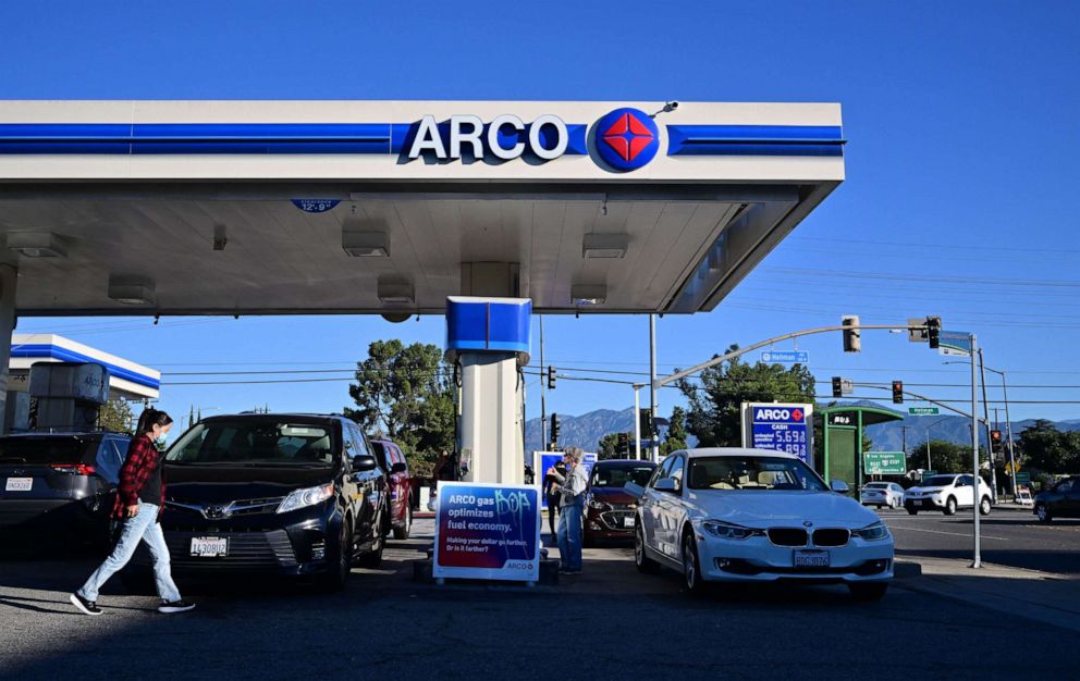 PHOTO: People get gas for their vehicles at a petrol station, Oct. 19, 2022, in Alhambra, California.
