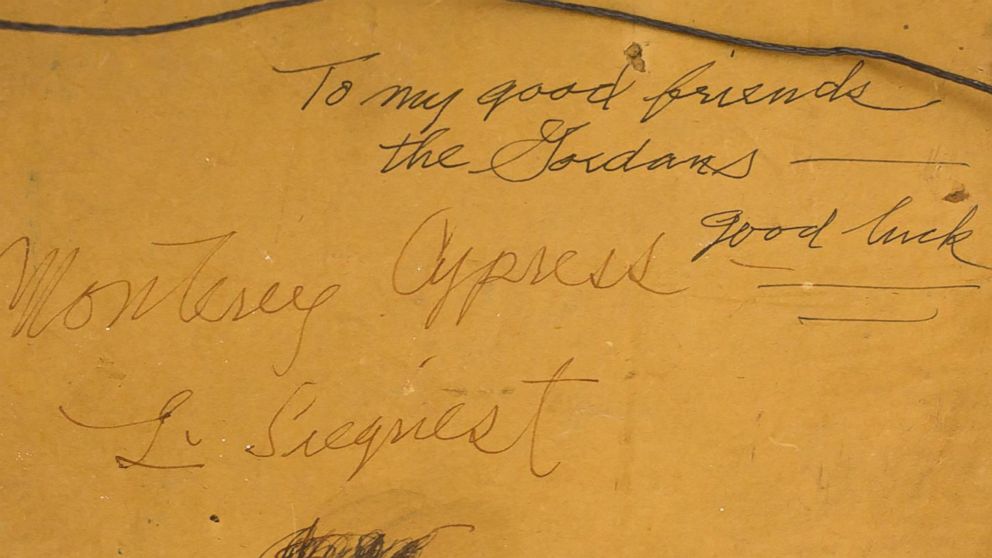 PHOTO: Artists' handwritten dedications to Jenifer Gordon (Walker) on their work.