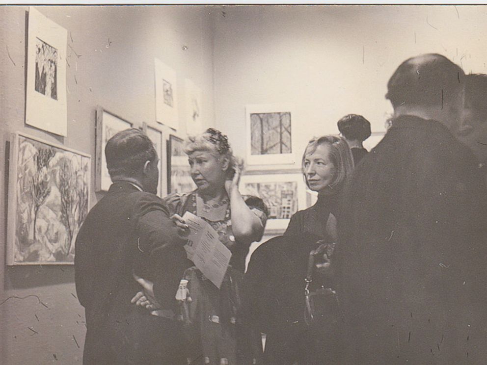 PHOTO: Jenifer Gordon (Walker) and Hazel Guggenheim McKinley admiring artwork.
