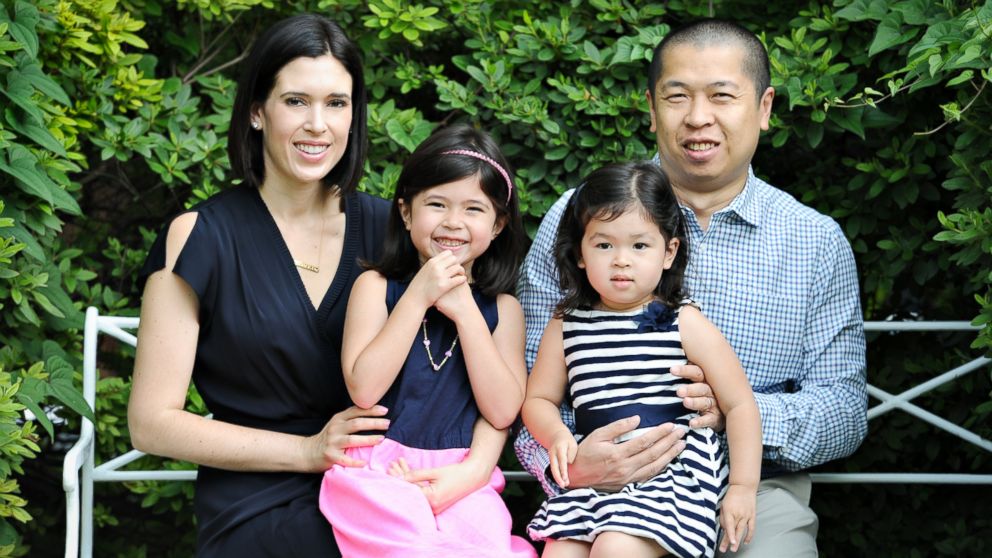 PHOTO: HOTorNOT co-founder Jim Young with wife Sarah and daughters Vivienne, right and Gemma.