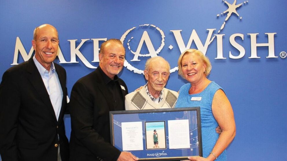 PHOTO: (L-R) David Williams and Michael Hickman of Make-A-Wish Foundation, Hartley Gaylord with an Adopt-A-Wish plaque in honor of his wife Sandy, Stephanie McCormick, President and CEO of Make-A-Wish Orange County and the Inland Empire.