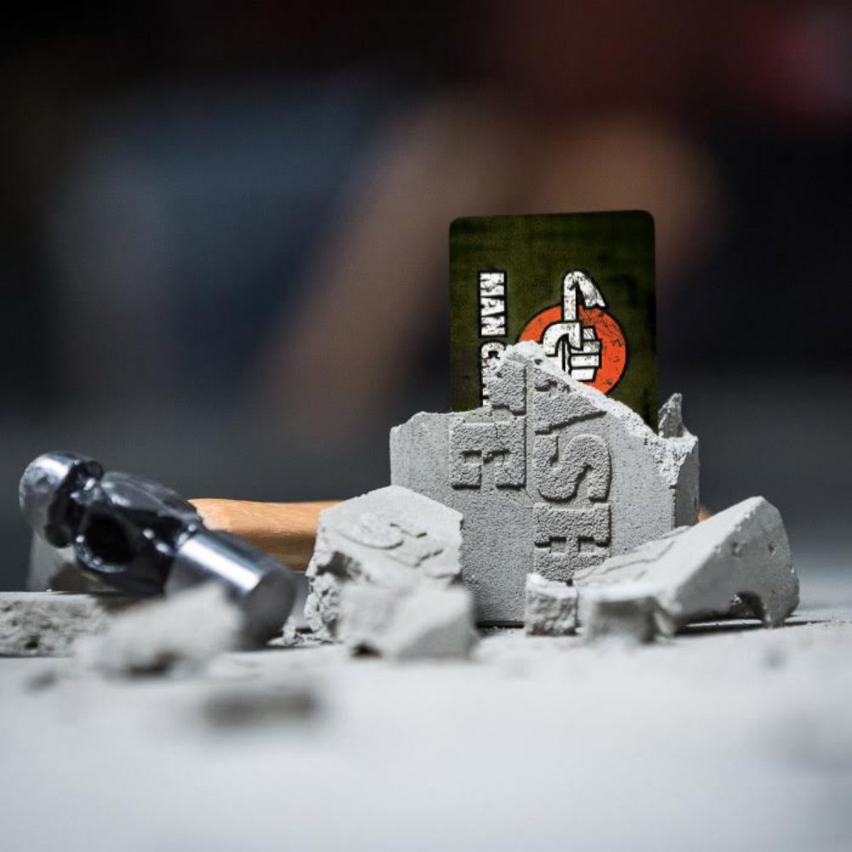 PHOTO: Give a gift card that comes in a concrete brick, along with a hammer and goggles. 