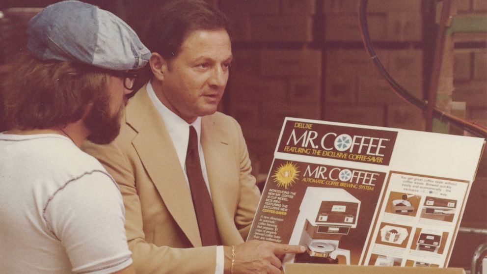 PHOTO: In this file photo, Vincent Marotta looks over the product packaging of Mr. Coffee, 1978. 