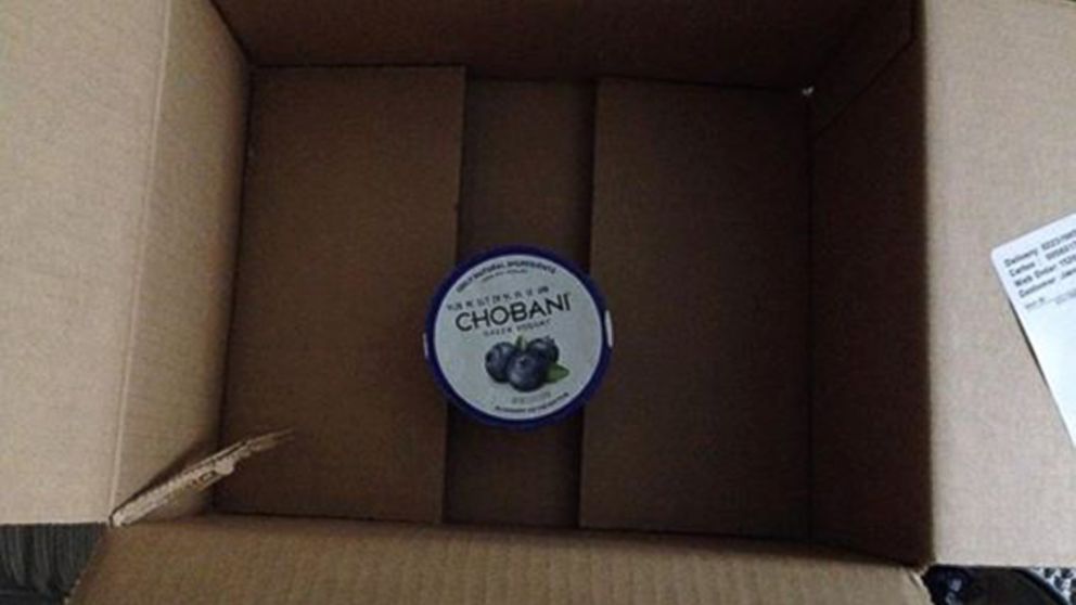 Grocery delivery company FreshDirect says excess packaging examples like this -- a box containing only one yogurt -- are rare.