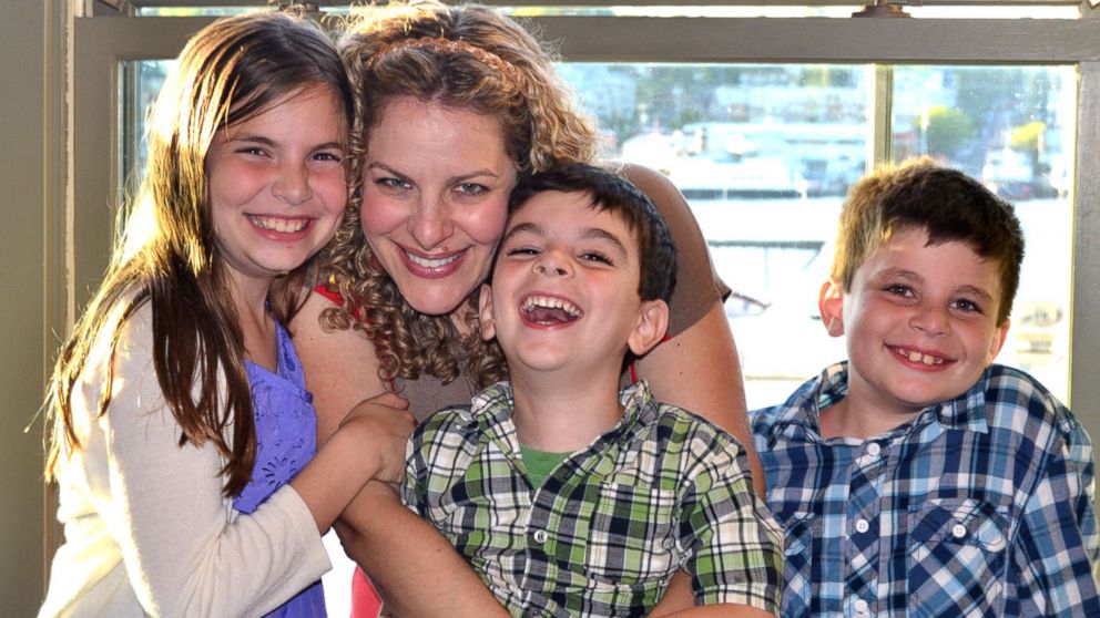 Jill Smokler, creator of popular parenting blog ScaryMommy.com, which is giving away $50 Thanksgiving gift cards to families, is pictured with her children.