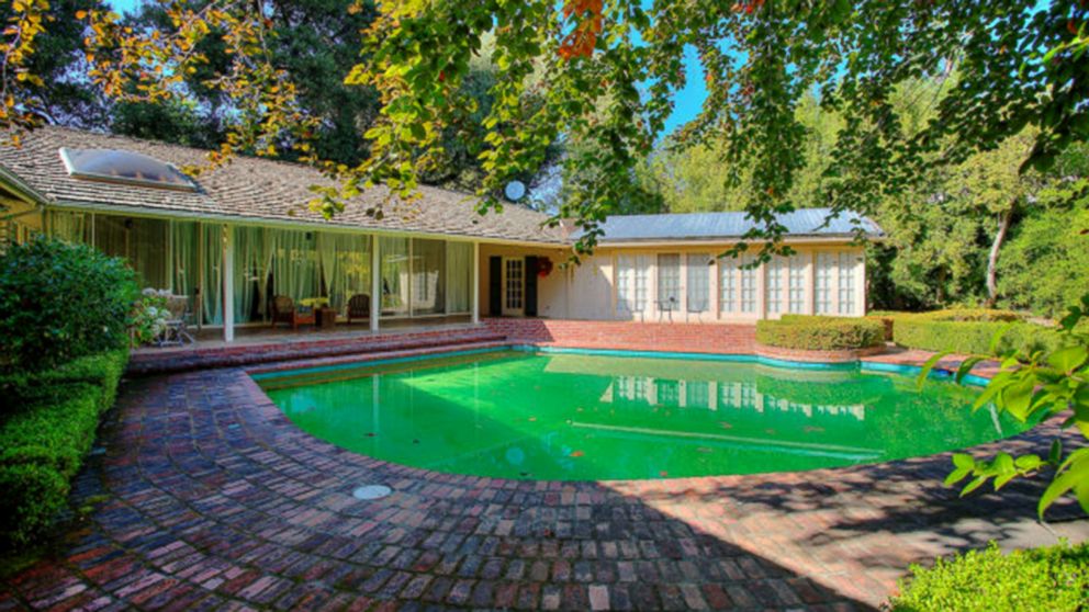Facebook founder Mark Zuckerberg purchased four of the surrounding houses near his Palo Alto home. Behind his current house, this pictured home sold for $4.8 million in Dec. 2012.