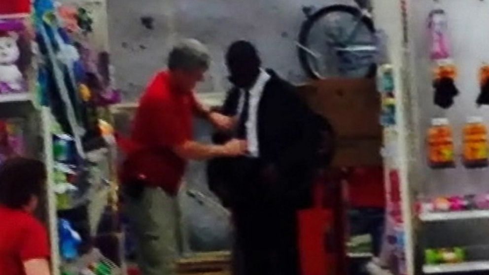 PHOTO: Target workers help a young man prep for job interview.