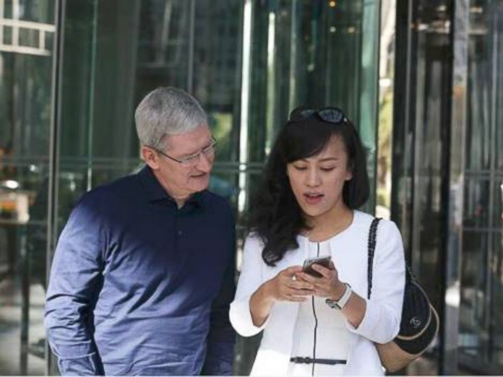 PHOTO: Tim Cook, CEO of Apple, and Jean Liu, president of Didi Chuxing, took a Didi taxi ride to a panel of Chinese app developers hosted by Apple on May 16, 2016, at the Apple Store in Wangfujing, Beijing.