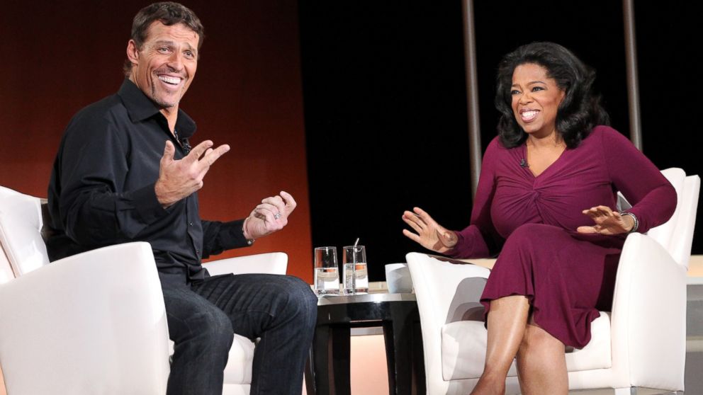 PHOTO: Tony Robbins, a New York Times Bestselling Author, speaks with Oprah Winfrey.