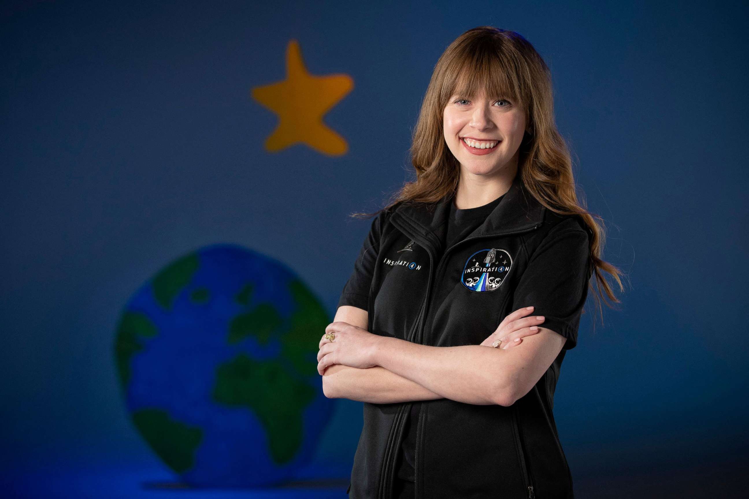 PHOTO: St. Jude Children's Research Hospital's physician assistant and cancer survivor Hayley Arceneaux, poses for a photo while visiting a SpaceX facility in Hawthorne, Calif.