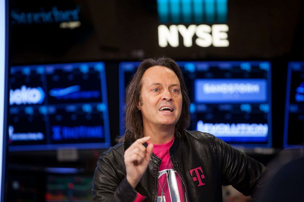PHOTO: John Legere, CEO and Chairman of T-Mobile, speaks during an interview on the floor of the New York Stock Exchange (NYSE) in New York, April 30, 2018.