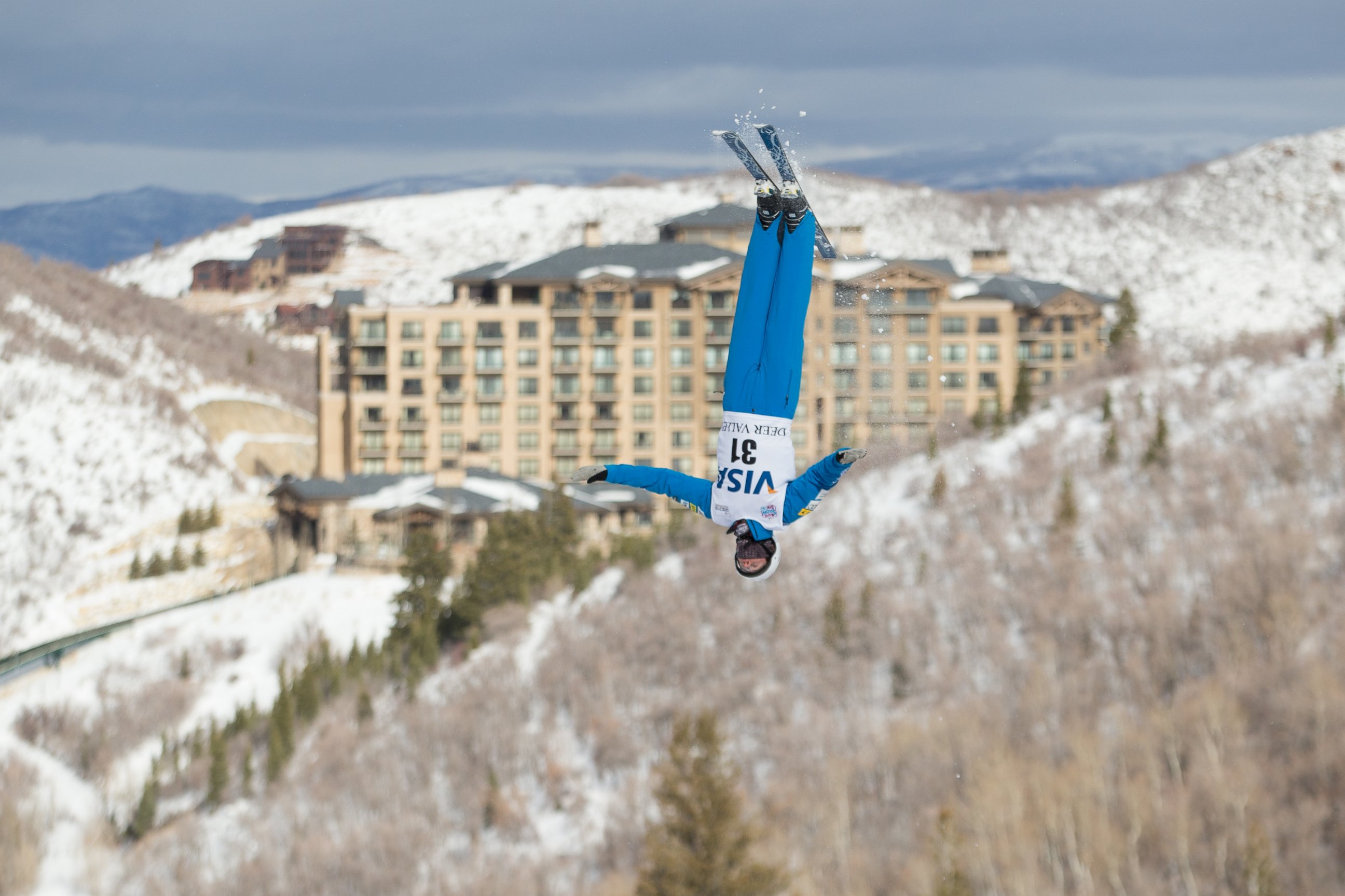 PHOTO: "Ski ambassador" Mac Bohonnon flies in front of The St. Regis Deer Valley, in Park City, Utah. 