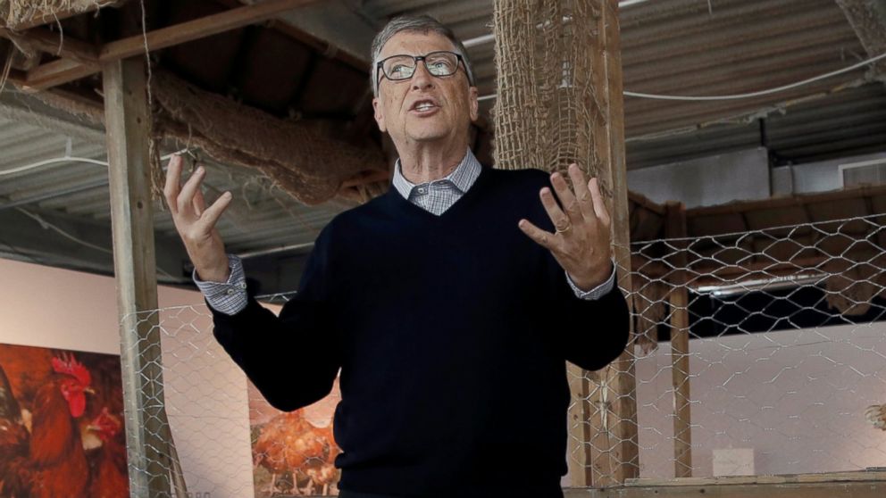 Billionaire philanthropist and Microsoft's co-founder Bill Gates speaks to the media, in front of a chicken coop set up on the 68th floor of the 4 World Trade Center tower in Manhattan, New York, June 8, 2016, while announcing that he is donating 100,000 chicks to developing countries with the goal of ending extreme poverty.