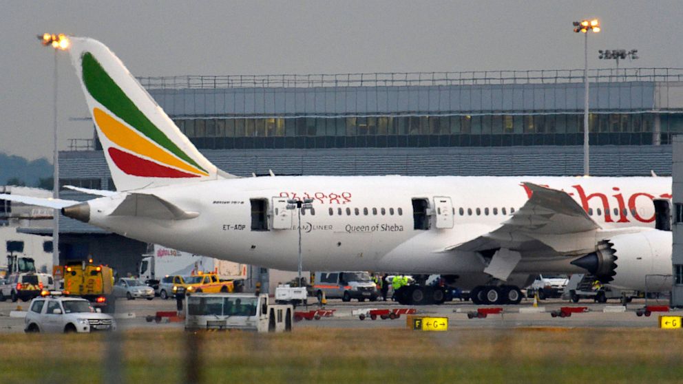 Emergency services attend to a Boeing 787 Dreamliner, operated by Ethiopian Airlines, after it caught fire at Britain's Heathrow airport in west London, July 12, 2013. 