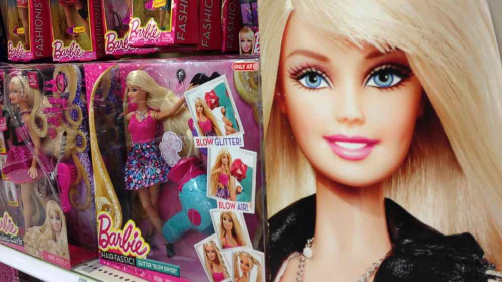 Barbie dolls are shown in the toy department of a retail store in Encinitas, Calif., Oct. 14, 2014.  