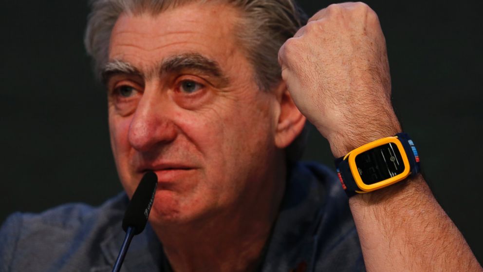 Swatch Group CEO Nick Hayek wears the new Swatch Touch Zero One during the Swiss watchmaker's annual news conference in Corgemont March 12, 2015.