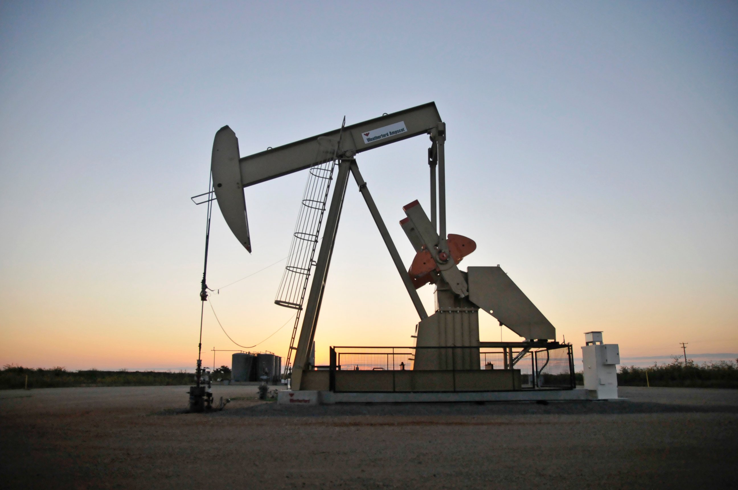 PHOTO: A pump jack operates at a well site leased by Devon Energy Production Company near Guthrie, Okla., Sept. 15, 2015.   