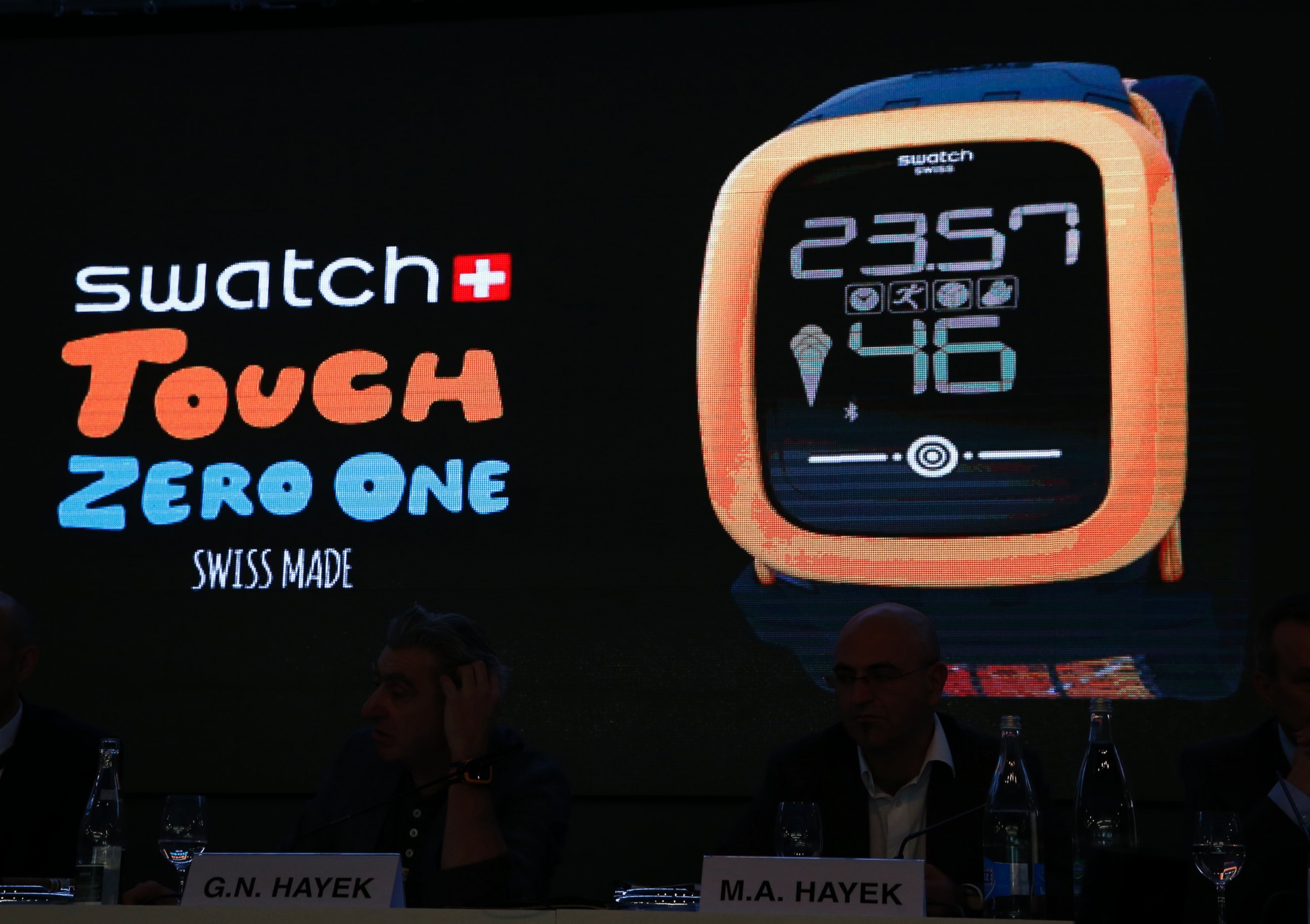 PHOTO: Swatch Group CEO Nick Hayek presents the new 'Swatch Touch Zero One' during the Swiss watchmaker's annual news conference in Corgemont March 12, 2015. 