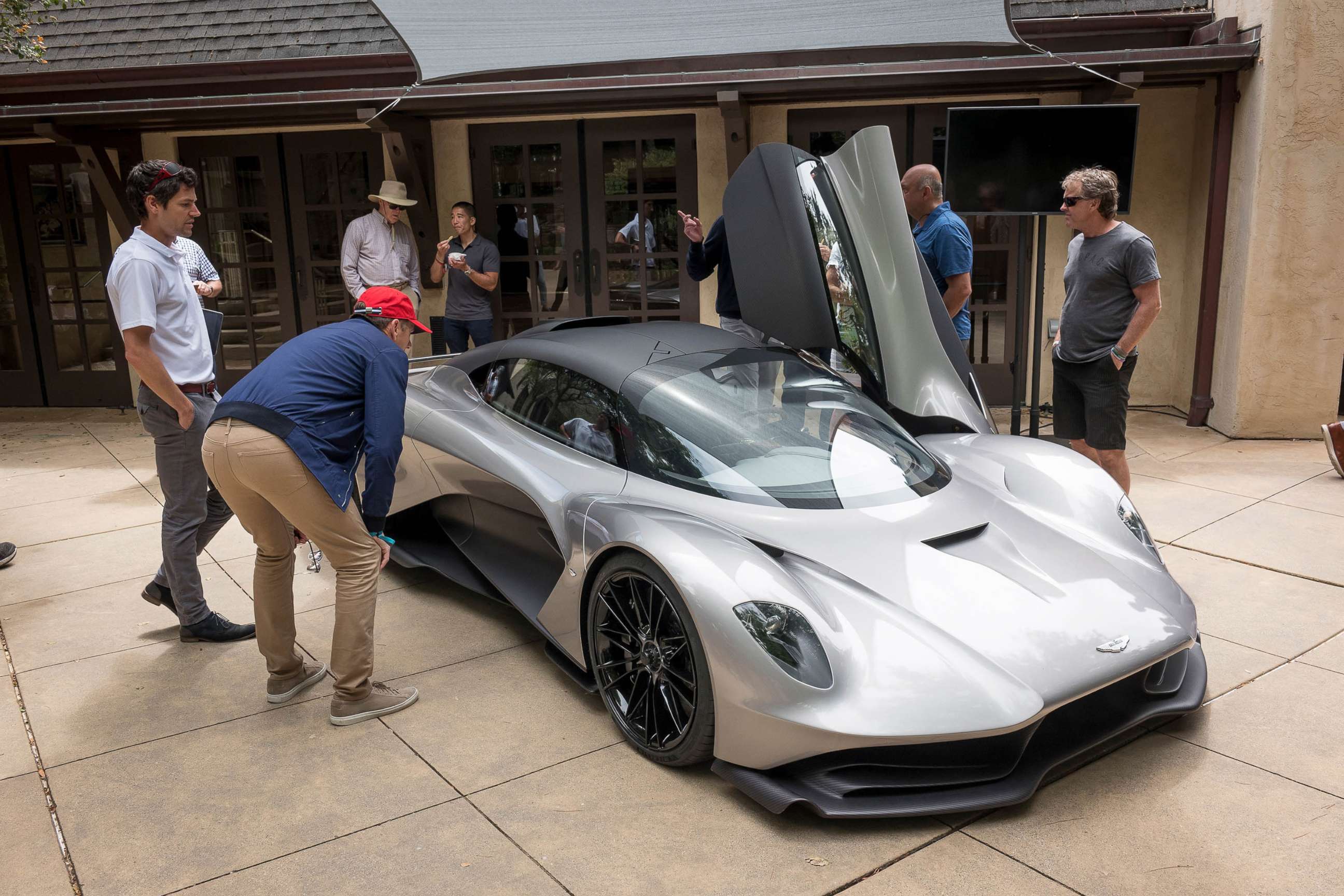 PHOTO: Attendees view the Aston Martin Lagonda Ltd. Valhalla supercar on display during an event at the 2019 Pebble Beach Concours d'Elegance in Carmel, Calif, Aug. 17, 2019.