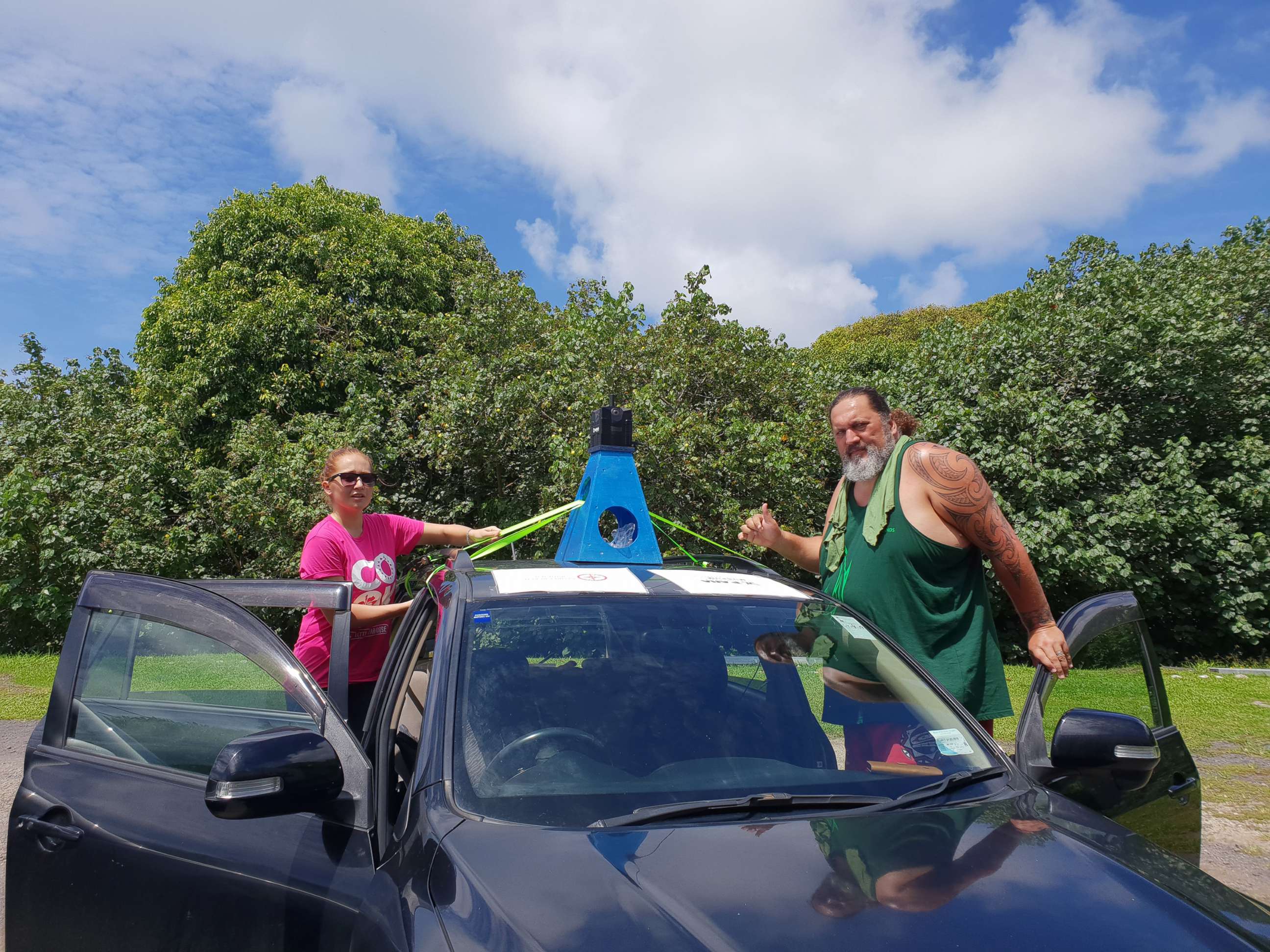 PHOTO: Wikuki Kingi, right, helps map out his neighborhood in Rarotonga, the Cook Islands in the South Pacific for Google Earth. 