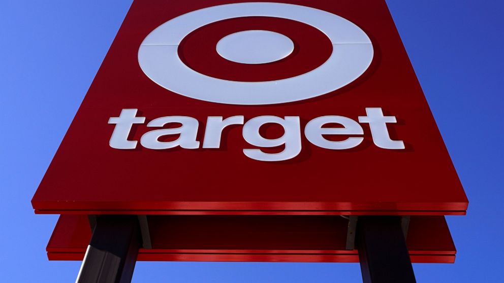 FILE - The bullseye logo on a sign outside a Target store is seen on Feb. 28, 2022. Target's first-quarter profit took a big hit from higher costs, despite strong sales growth. Target's results Wednesday, May 18, reflect the pressure on retailers' pr