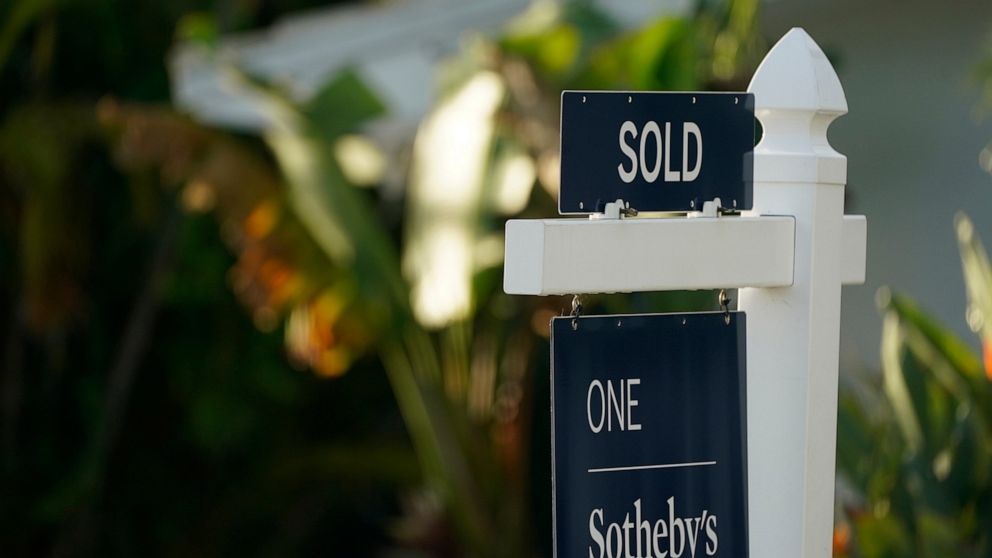 A sold sign is shown in front of a home, Monday, Sept. 20, 2021, in Surfside, Fla. Average long-term U.S. mortgage rates rose this week as the key 30-year loan vaulted over 4% for the first time since May 2019. Mortgage buyer Freddie Mac reports, Thu