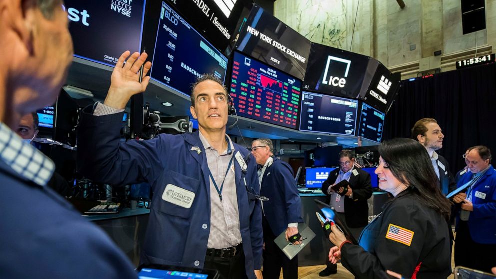 Traders work on the floor at the New York Stock Exchange Friday, May 6, 2022 in New York. Stocks are swinging sharply on Friday. The S&P 500 was 0.5% lower in afternoon trading but only after careening from a steep morning loss to a brief, small gain