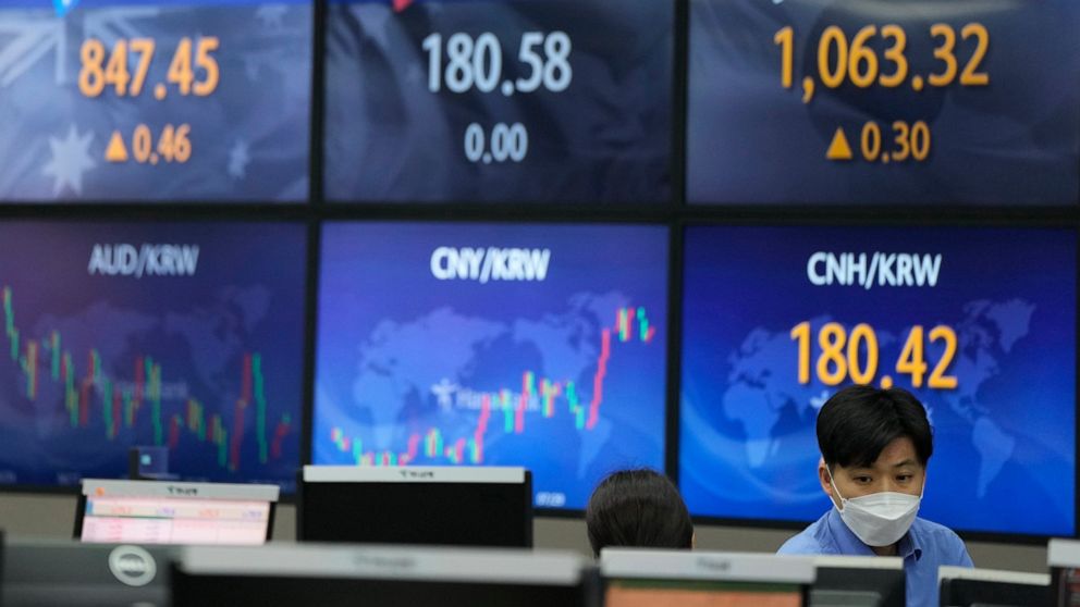 A currency trader watches monitors at the foreign exchange dealing room of the KEB Hana Bank headquarters in Seoul, South Korea, Friday, Aug. 27, 2021. Asian stock markets were mixed Friday as investors awaited more guidance on the U.S. Federal Reser