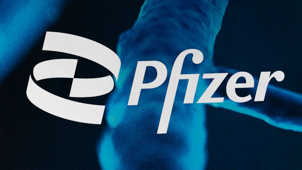 FILE - The Pfizer logo is displayed at the company's headquarters, Feb. 5, 2021, in New York. Sales of Pfizer’s COVID-19 vaccine and treatment in the second quarter propelled the pharmaceutical giant to the largest quarterly sales in its history, Thu