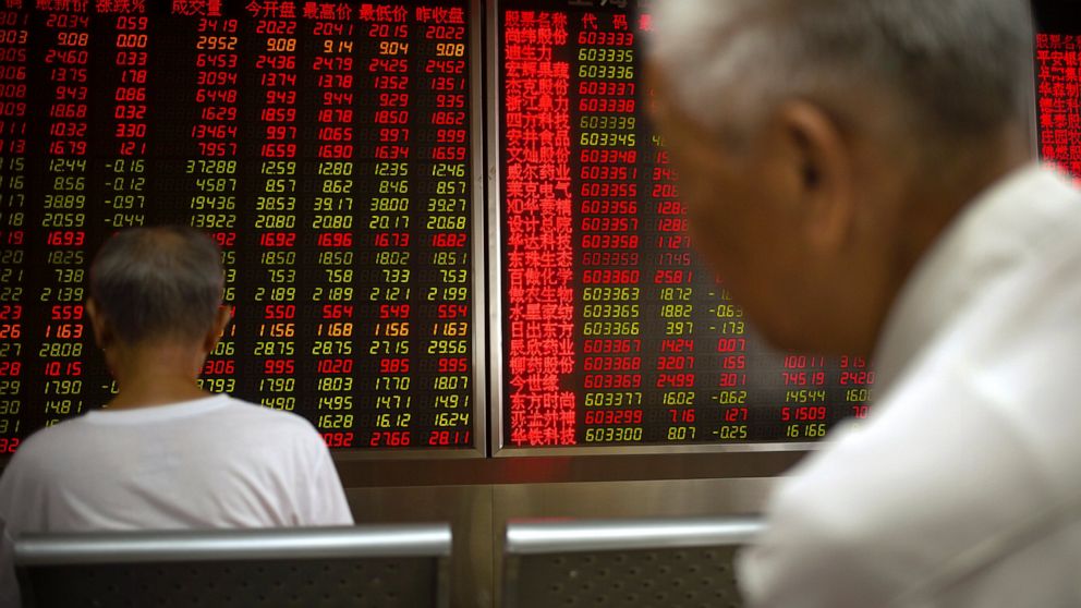 Chinese investors monitor stock prices at a brokerage house in Beijing, Thursday, June 20, 2019. Asian shares were higher on Thursday, with the Shanghai benchmark up 2.6%, after the Federal Reserve reaffirmed that it’s prepared to cut interest rates 