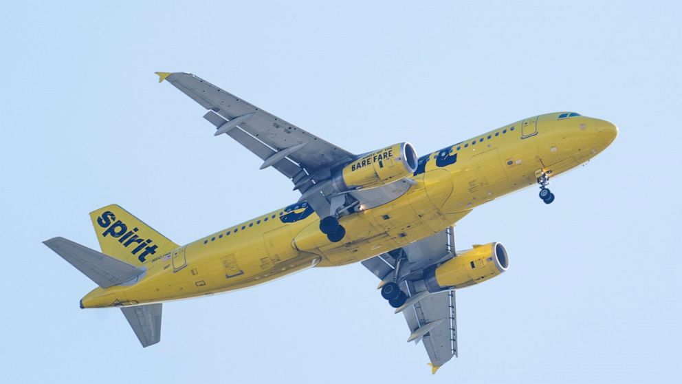 FILE - A Spirit Airline aircraft approaches Philadelphia International Airport Friday, Oct. 22, 2021. A firm that advises investors on proxy voting said Tuesday, May 31, 2022, that Spirit shareholders should oppose Frontier Airlines’ bid to buy Spiri