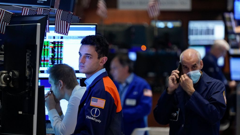 Traders work on the floor at the New York Stock Exchange in New York, Wednesday, June 15, 2022. U.S. stocks are rallying Wednesday and are on track for their first gain in six days. But more turbulence may be ahead when the Federal Reserve announces 