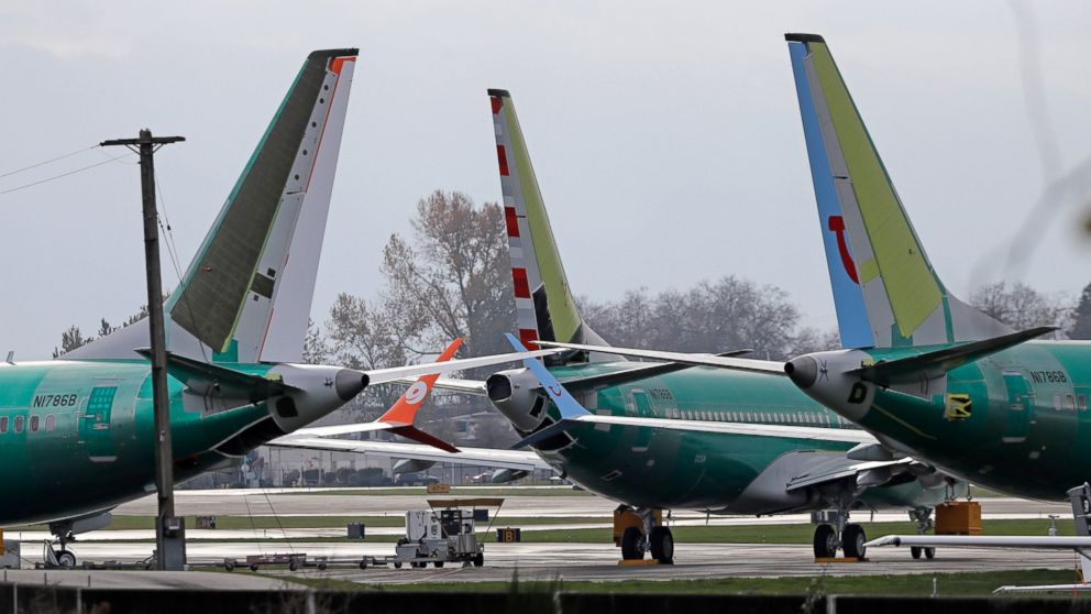 FILE- In this Nov. 14, 2018, file photo Boeing 737 MAX 8 planes are parked near Boeing Co.'s 737 assembly facility in Renton, Wash. Investigators were rushing to the scene of a devastating plane crash in Ethiopia on Sunday, March 10, 2019, an acciden