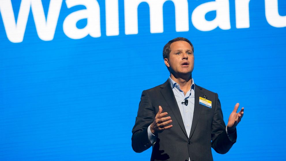 FILE - In this June 2, 2017 file photo, Walmart CEO Doug McMillon speaks during the Walmart shareholders meeting at Bud Walton Arena in Fayetteville, Ark. The Business Roundtable, a group that represents the most powerful companies in America, is nam