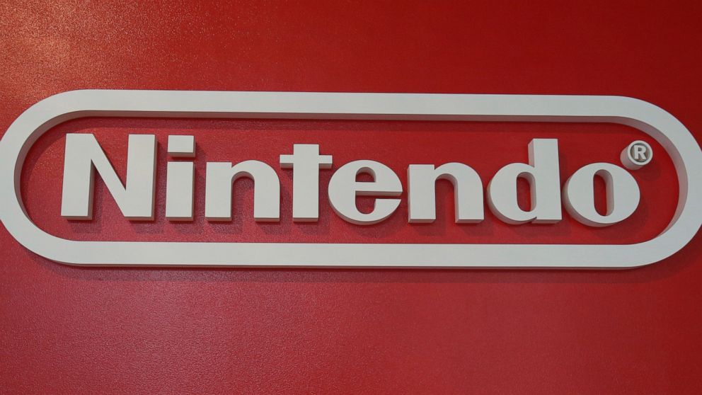 In this June 19, 2018, photo, a logo of Nintendo hangs at Panasonic center in Tokyo. Nintendo, the Japanese video game maker behind the Super Mario and Pokemon franchises, is reporting a 25 percent jump in fiscal third-quarter profit, boosted by the popularity of games for its Switch console. (AP Photo/Koji Sasahara)