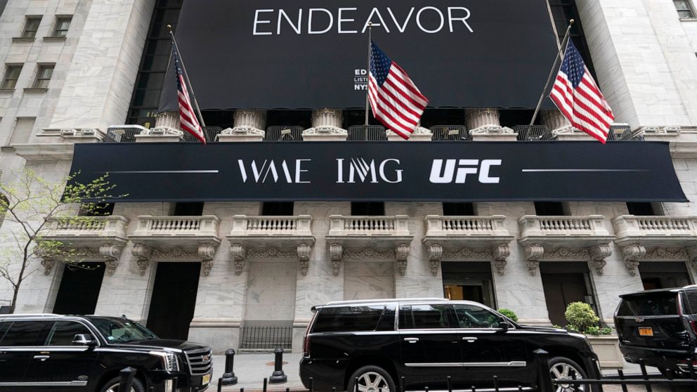 The banner for Endeavor hangs on the New York Stock Exchange, Thursday, April 29, 2021, in New York. The company behind Hollywood talent agency WME, the Miss Universe contest, and the mixed martial arts Ultimate Fighting Championship is having its IP
