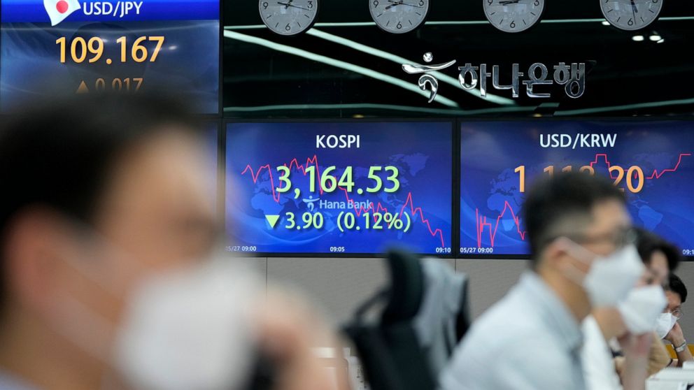 Asian shares mixed with eyes on inflation, US economy